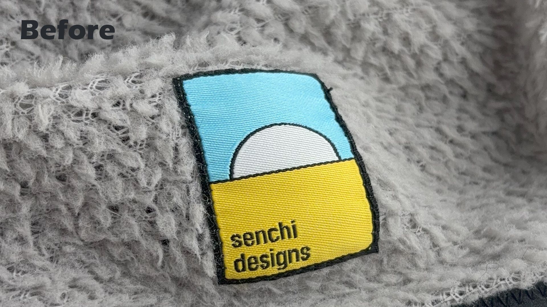 enchi designs old logo patch with brand name – before 2025（Senchi Designs 舊版織標｜含文字）